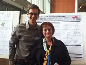Dr. Ruhlandt with student in front of his poster.