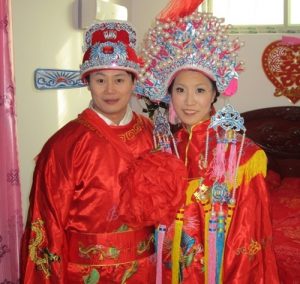 Male and female in traditional wedding dress