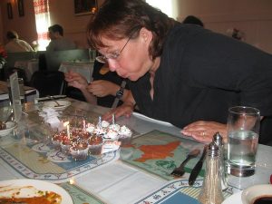 Dr Ruhlandt blowing out candles